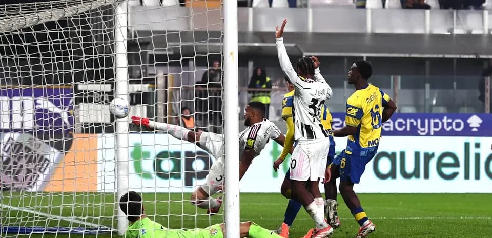 Goalkeeper saves shot during Juventus vs Parma match