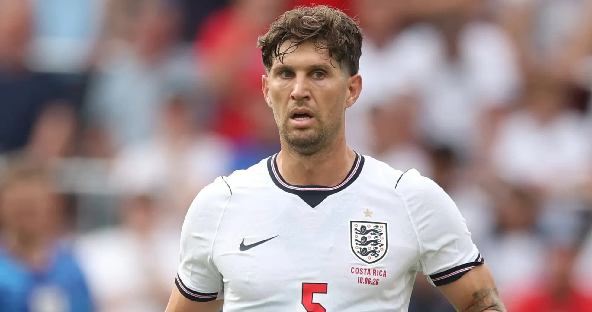 Player wearing England jersey during match action