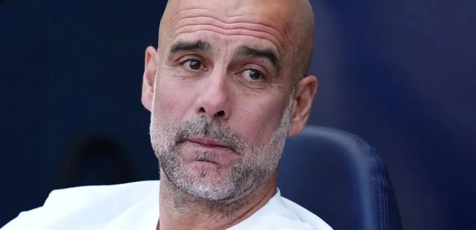 Coach sitting on bench during a match