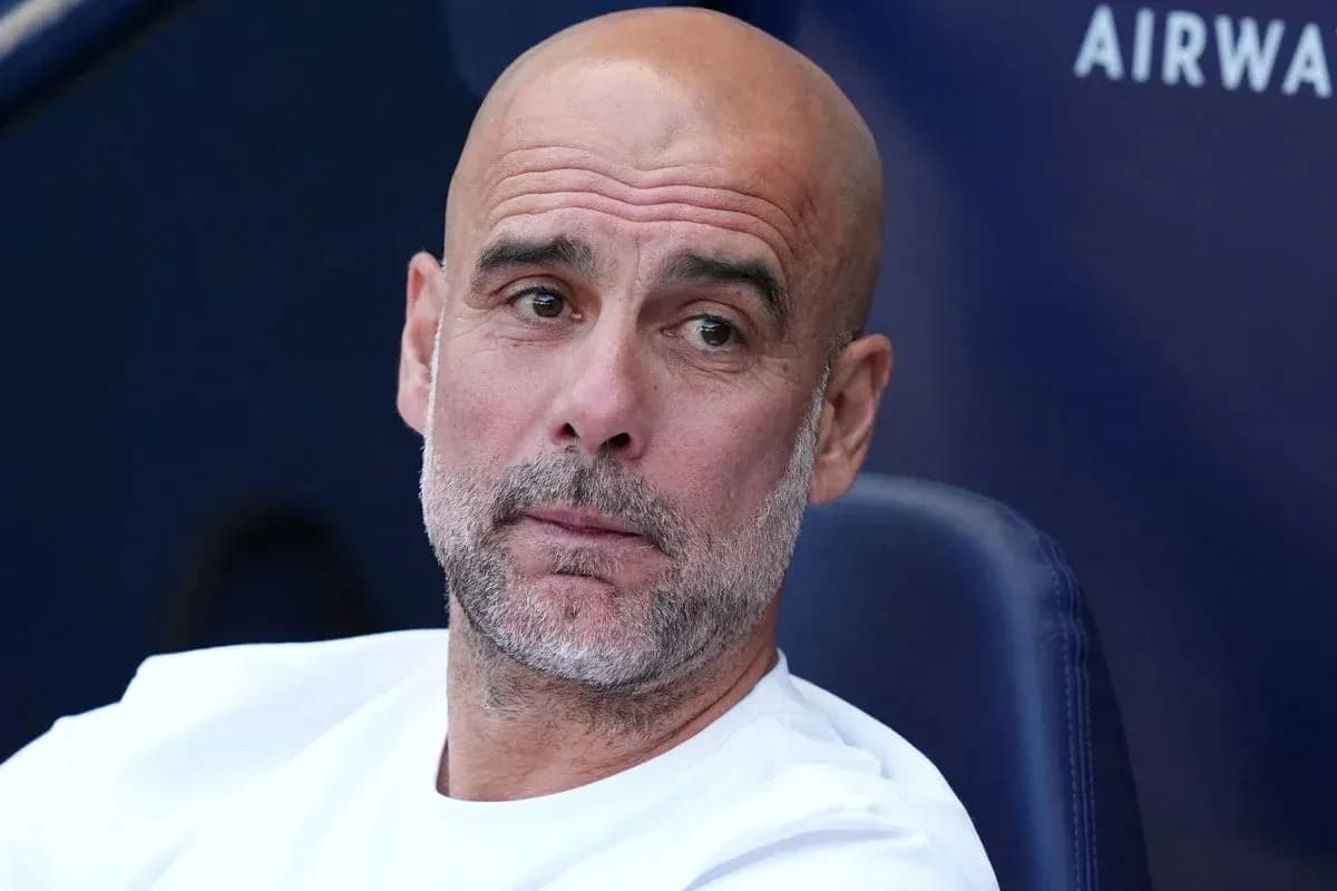 Coach sitting on bench during a match