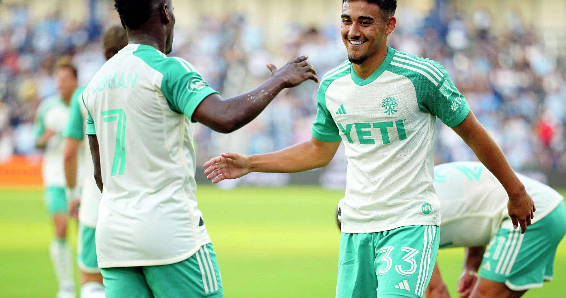 Players celebrating during Sporting KC II match