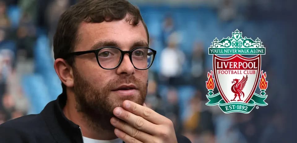 Man with glasses in stadium, Liverpool logo background