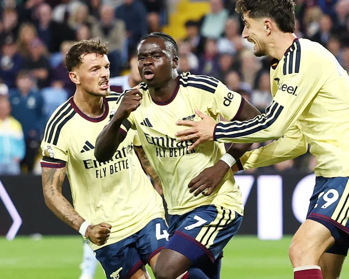 Arsenal players celebrating a goal during match