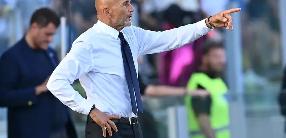 Coach directing players during a match on the sidelines
