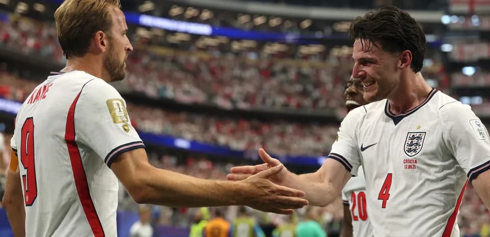 Harry Kane and Declan Rice celebrating on field