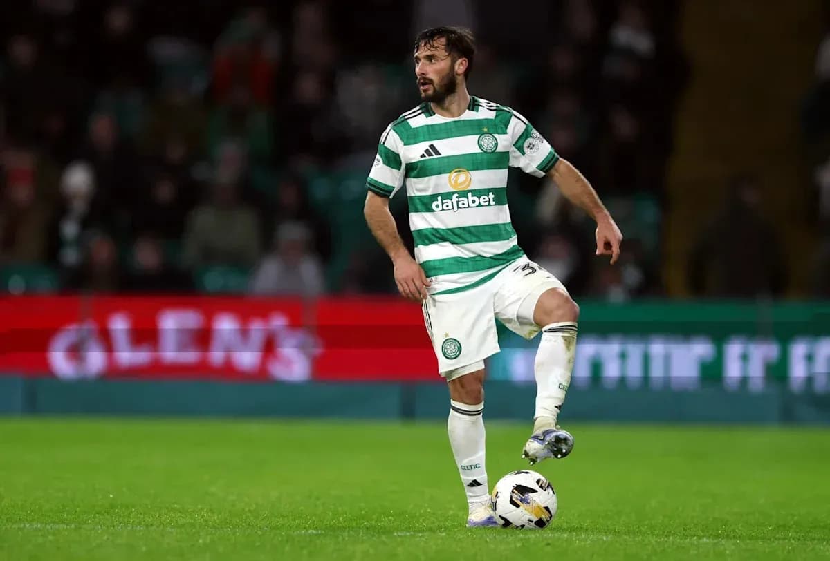 Celtic player controlling the ball on the pitch