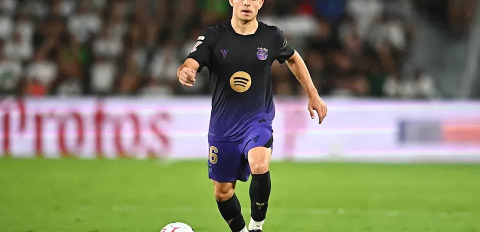 Player dribbling the ball during a soccer match
