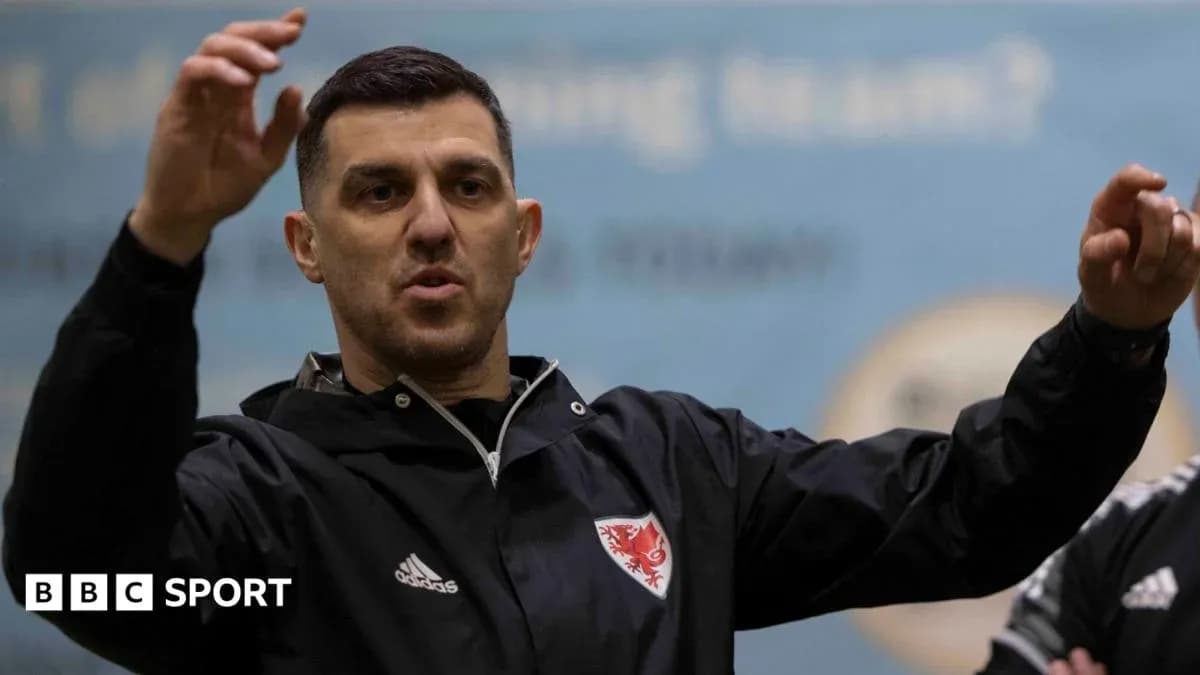 Coach gesturing during a training session indoors