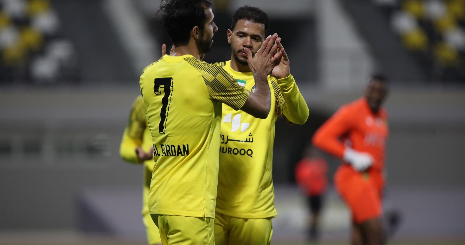 Players celebrating during U23 football match