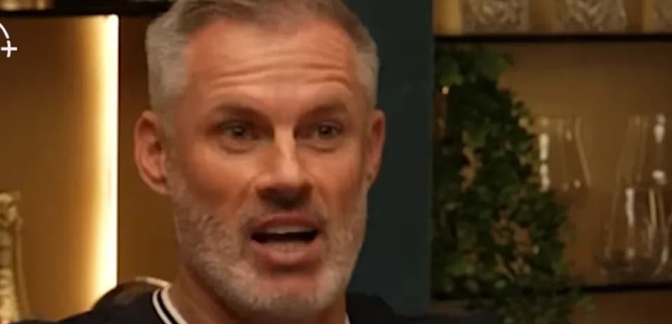 Man speaking animatedly in a casual setting
