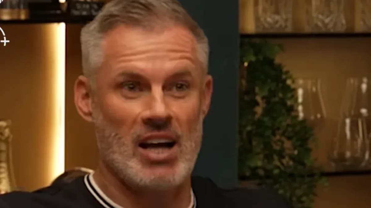 Man speaking animatedly in a casual setting