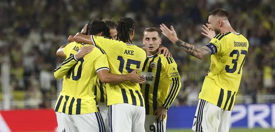 Fenerbahçe players celebrating a goal together