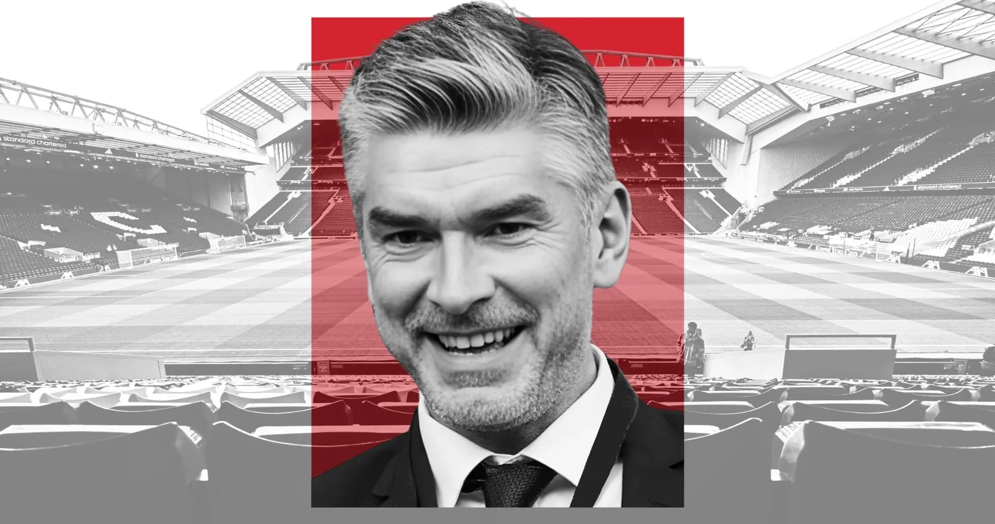 Man smiling in front of football stadium backdrop