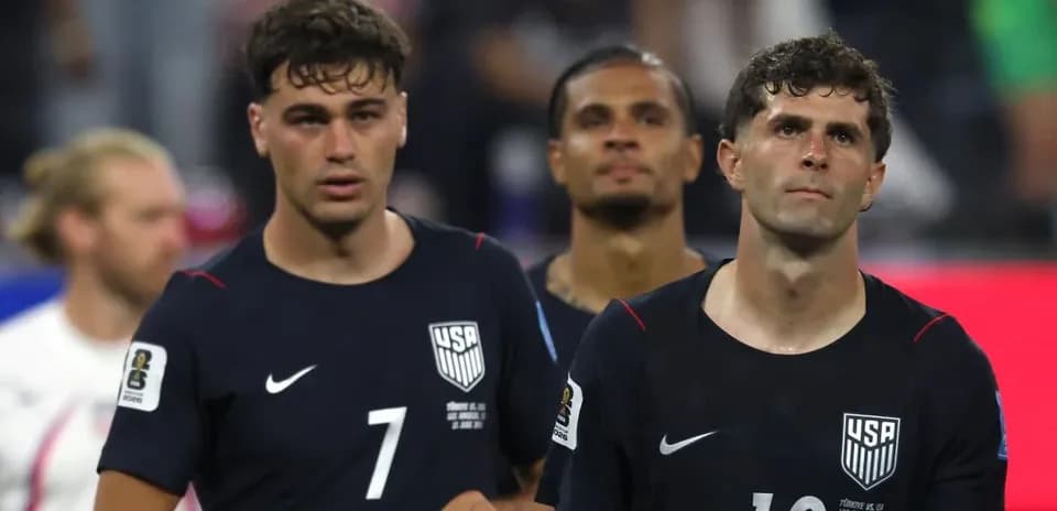 Three US players walking off the field after match