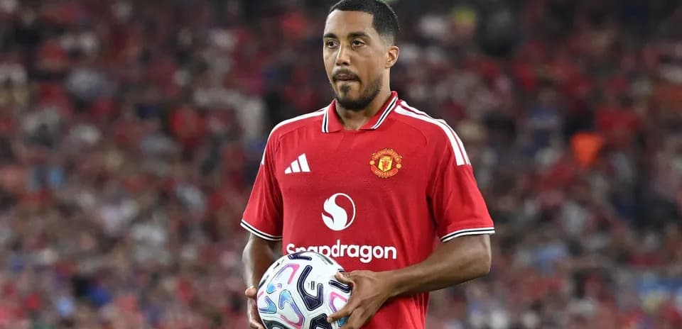 Player holding ball during Manchester United match