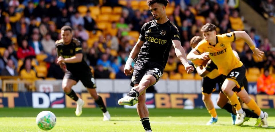 Player taking a penalty kick for Wolves