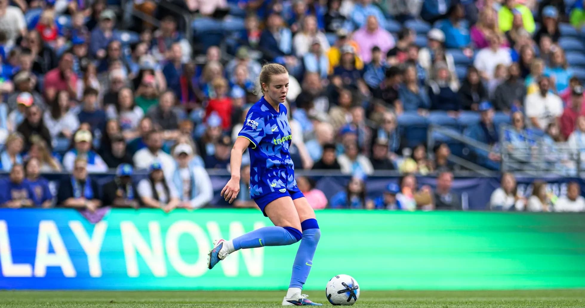 Player kicking the ball during Seattle Reign match