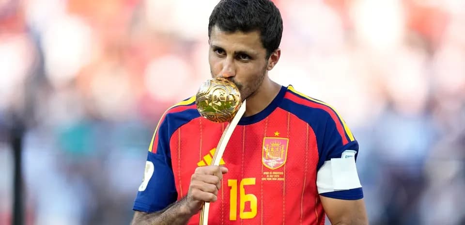 Player kissing trophy after winning tournament