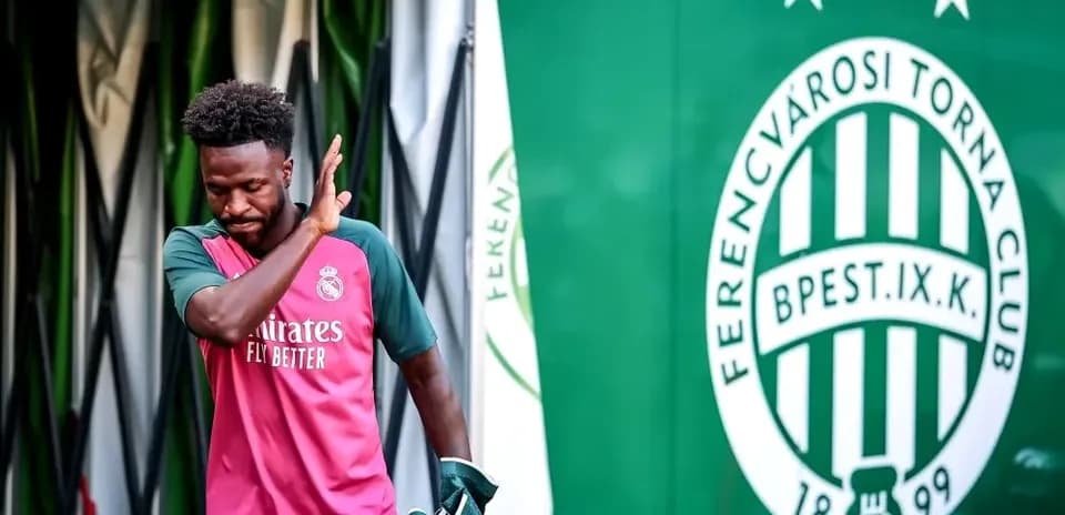 Player in Real Madrid kit entering stadium tunnel
