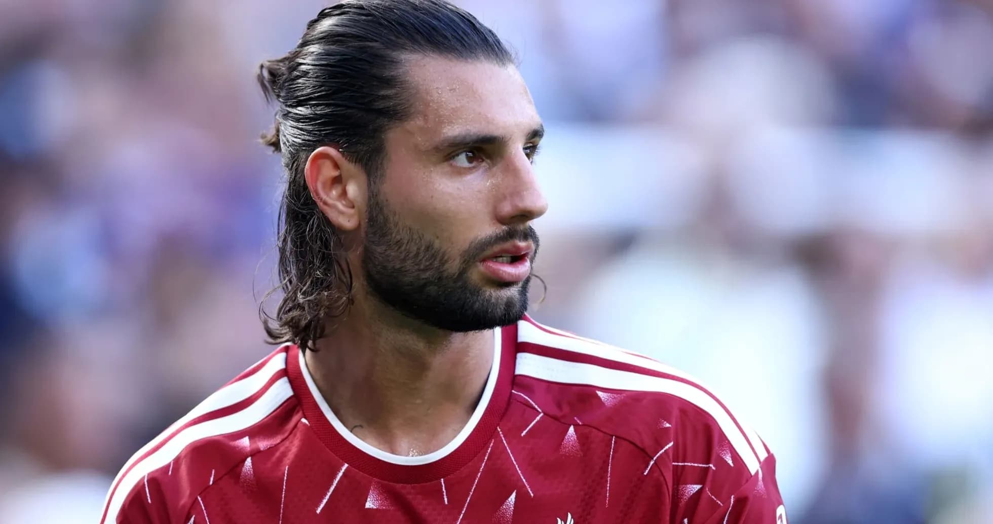 Player in Liverpool kit during match preparation