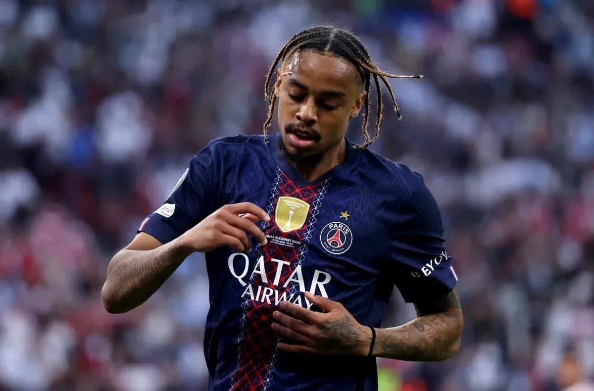 Player adjusting jersey during match for Paris Saint-Germain