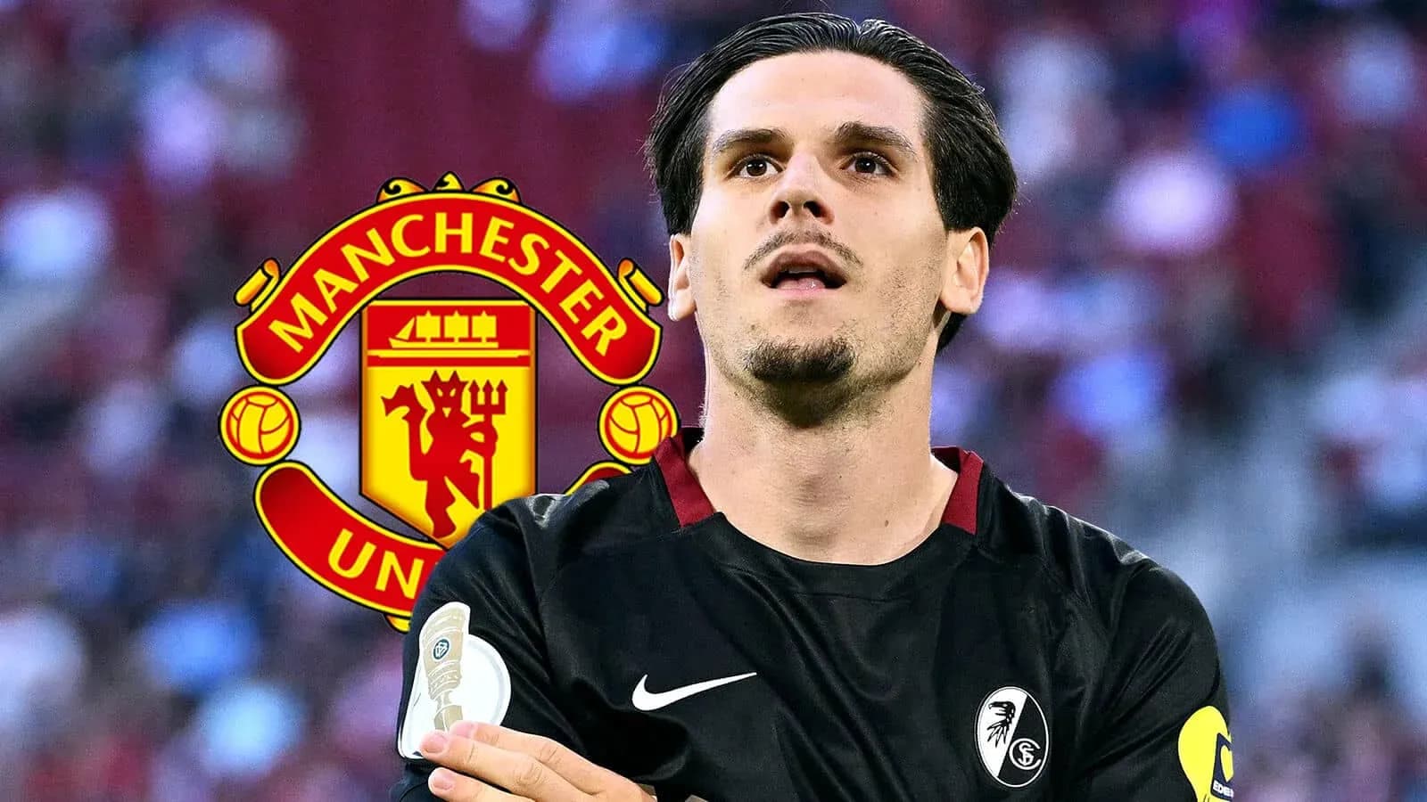 Player in black kit with Manchester United logo background
