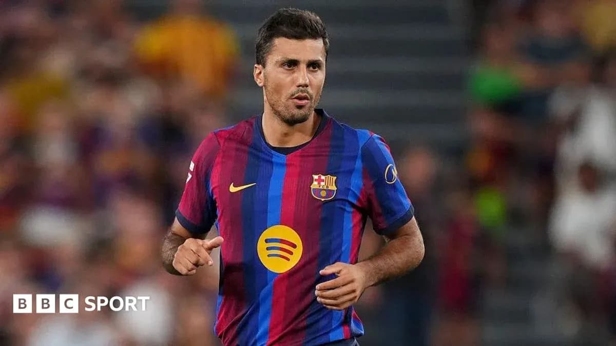 Barcelona player running on the pitch during match