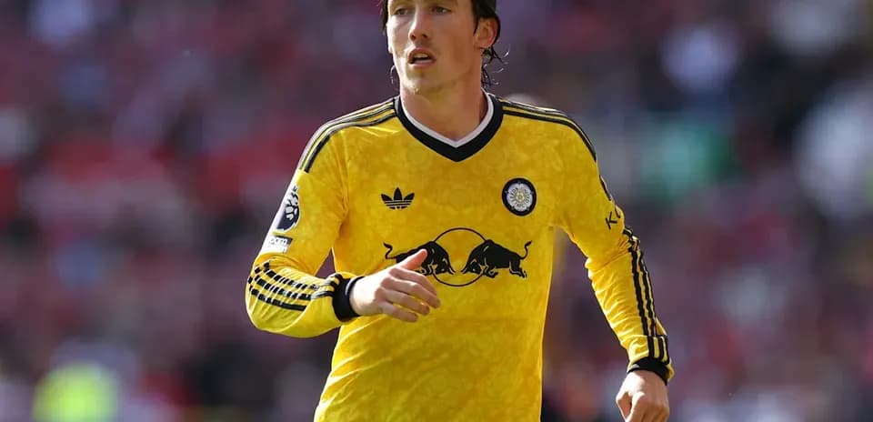 Player running in yellow jersey during match