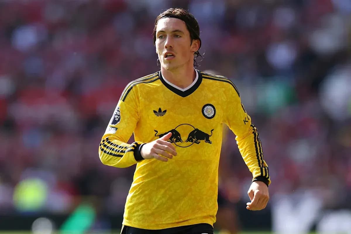 Player running in yellow jersey during match