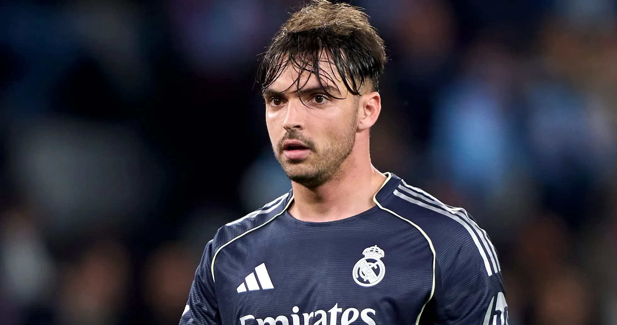 Goalkeeper in Real Madrid jersey on field