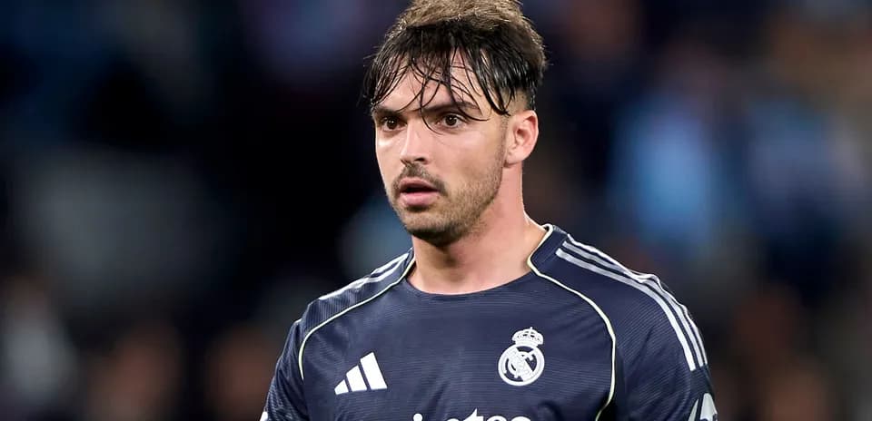 Goalkeeper in Real Madrid jersey on field