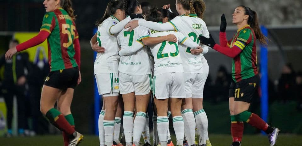Players celebrating after scoring a goal