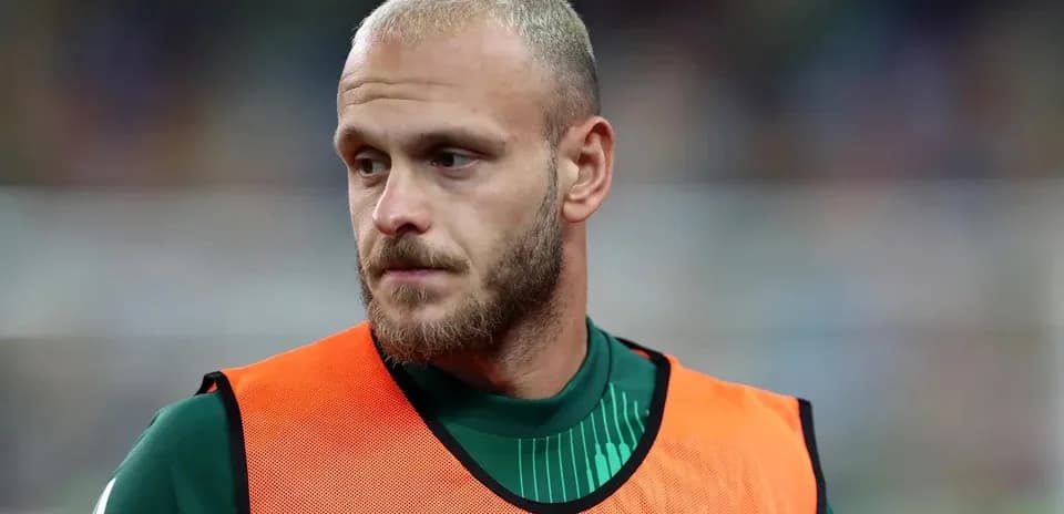 Goalkeeper in training vest before match