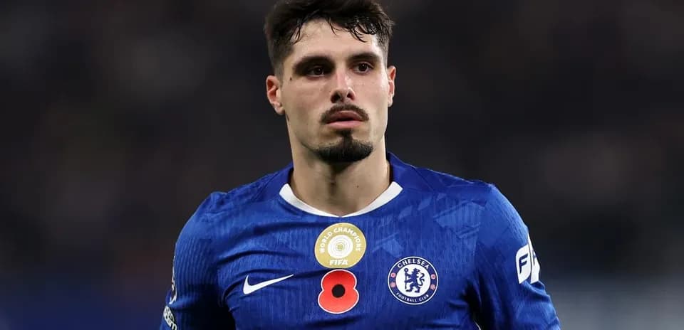 Player in blue Chelsea kit during match