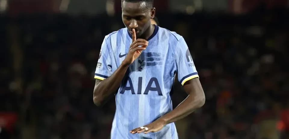 Player shushing crowd during match celebration