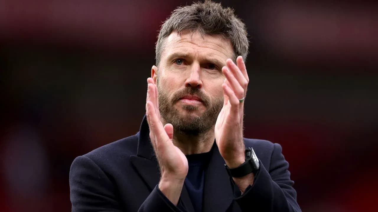 Coach applauding fans after the match