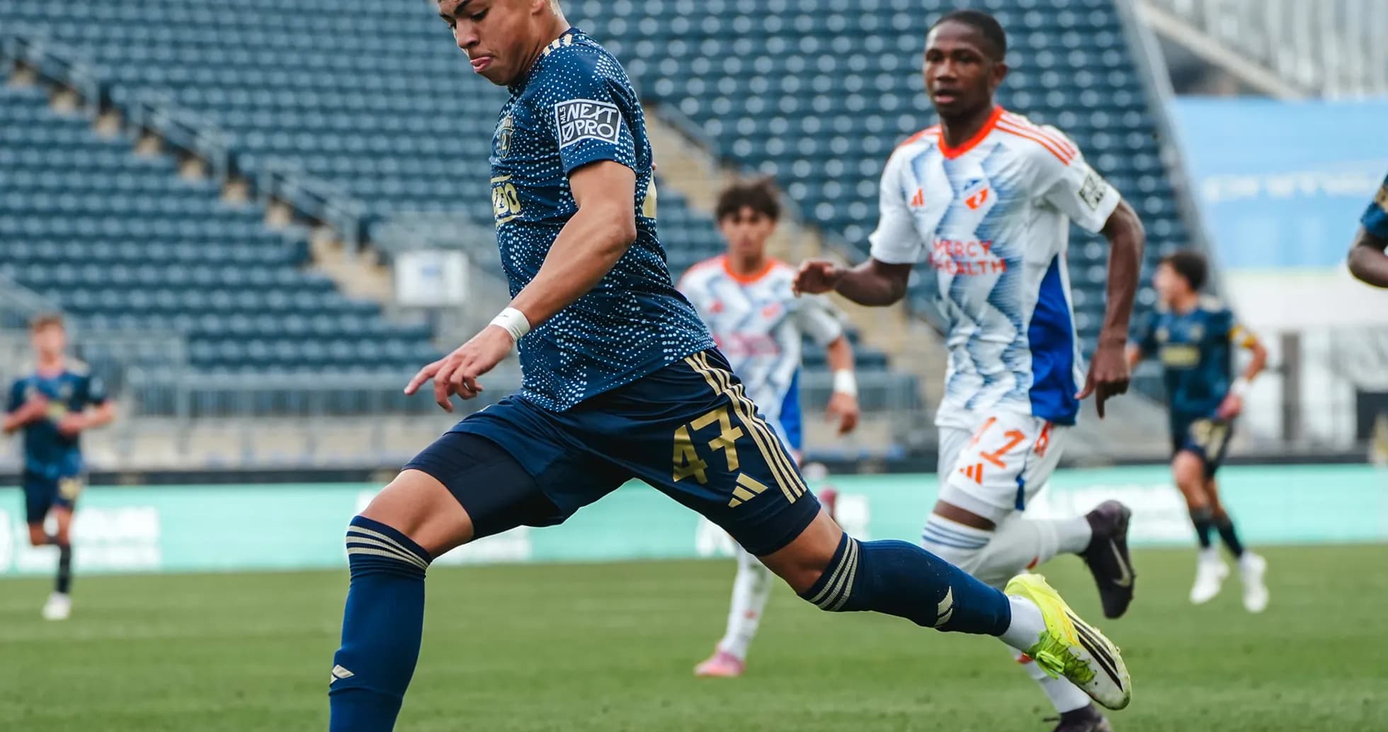 Player kicking ball during Philadelphia Union II match