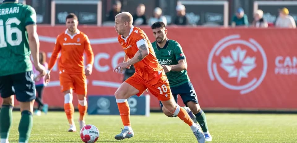 Player dribbling the ball during match