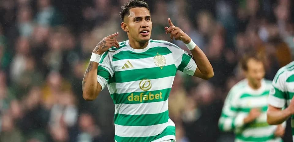 Player celebrating a goal in Celtic jersey