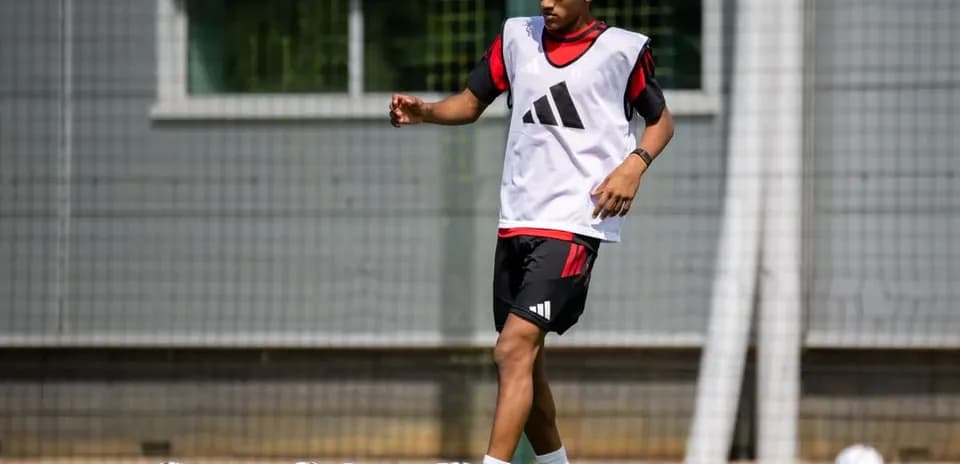 Player dribbling soccer ball during training session