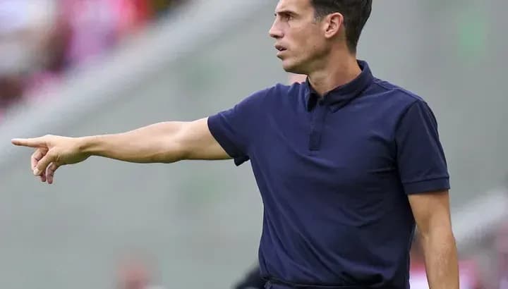 Coach directing players from the sideline