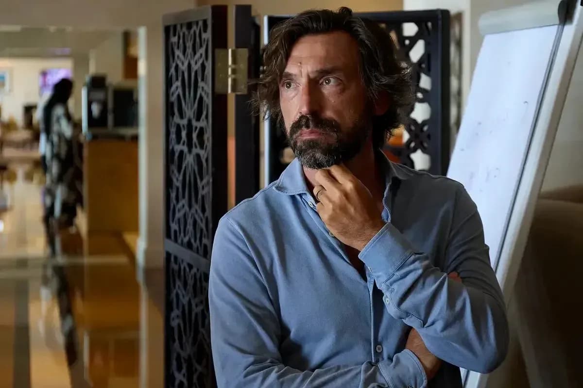 Man in blue shirt thinking in a hotel lobby