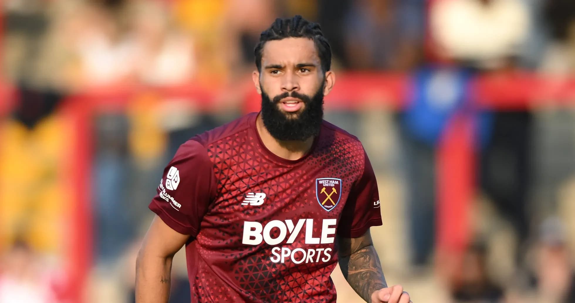 Player wearing West Ham United jersey during match