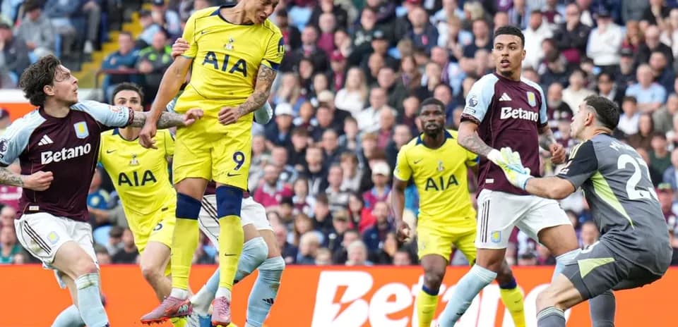 Players competing for the ball in Tottenham match
