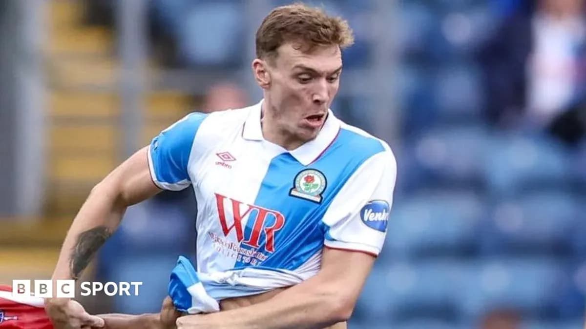 Player in Blackburn Rovers kit during match action