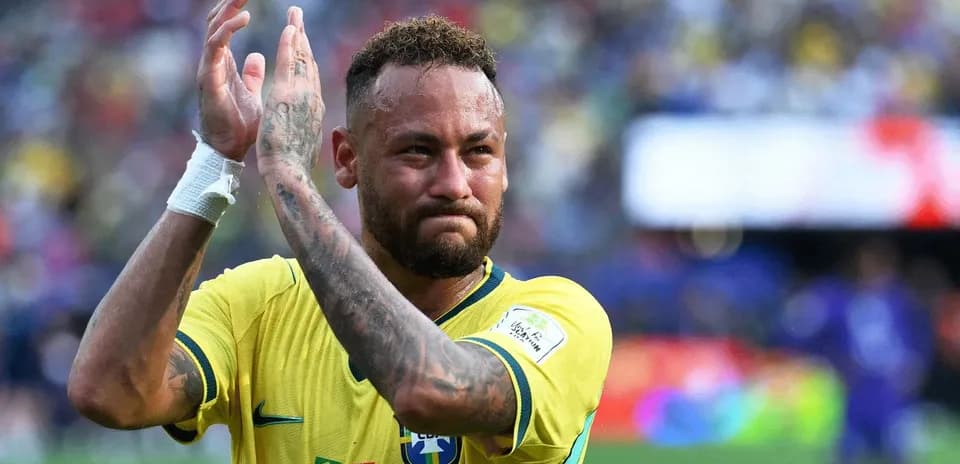 Player applauding fans after a match