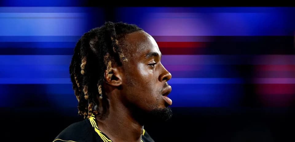 Athlete with braided hair in profile view
