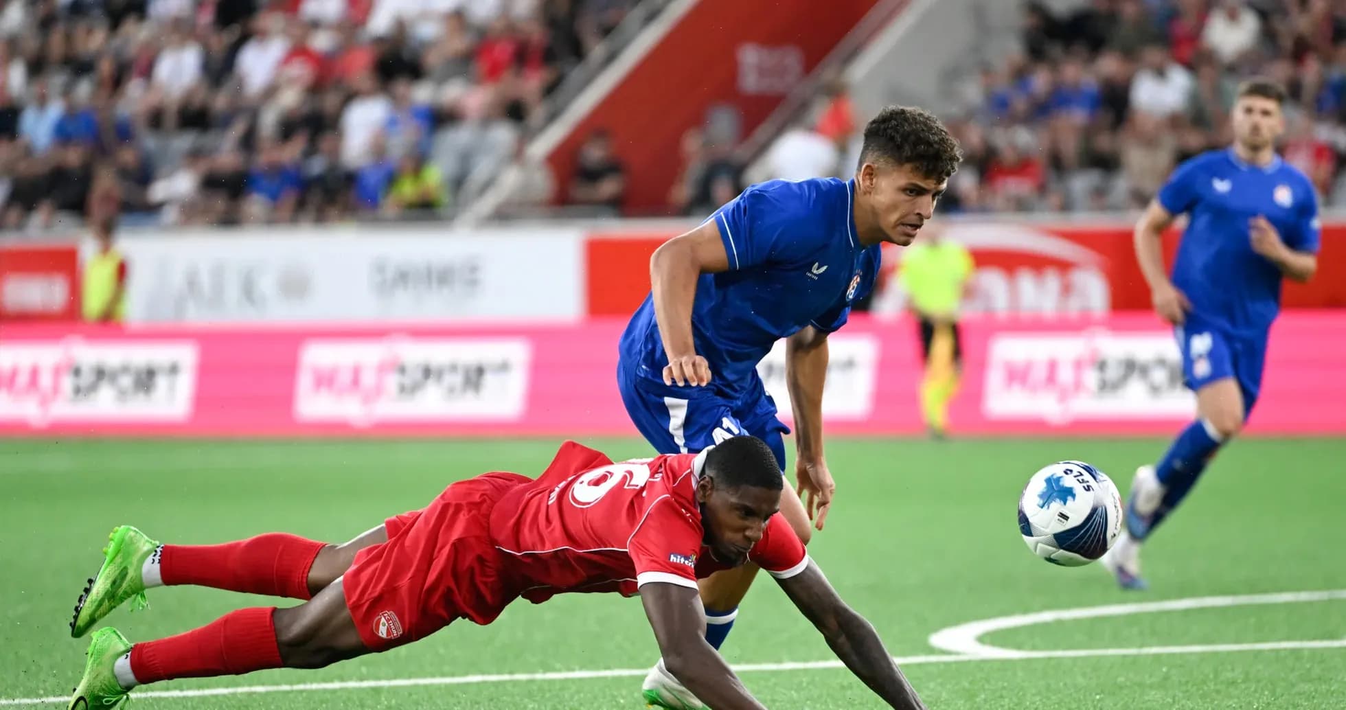 Player falling while opponent moves with ball