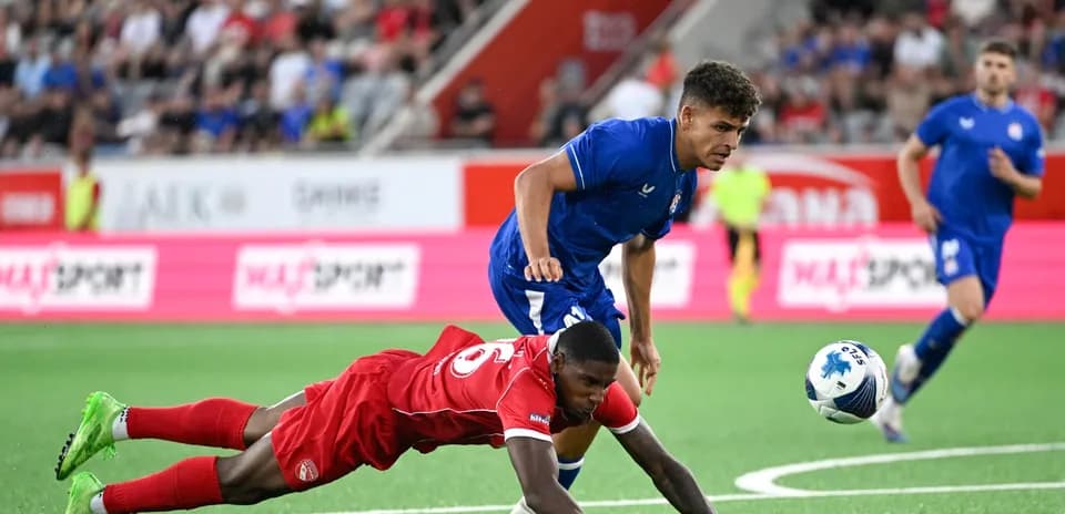 Player falling while opponent moves with ball