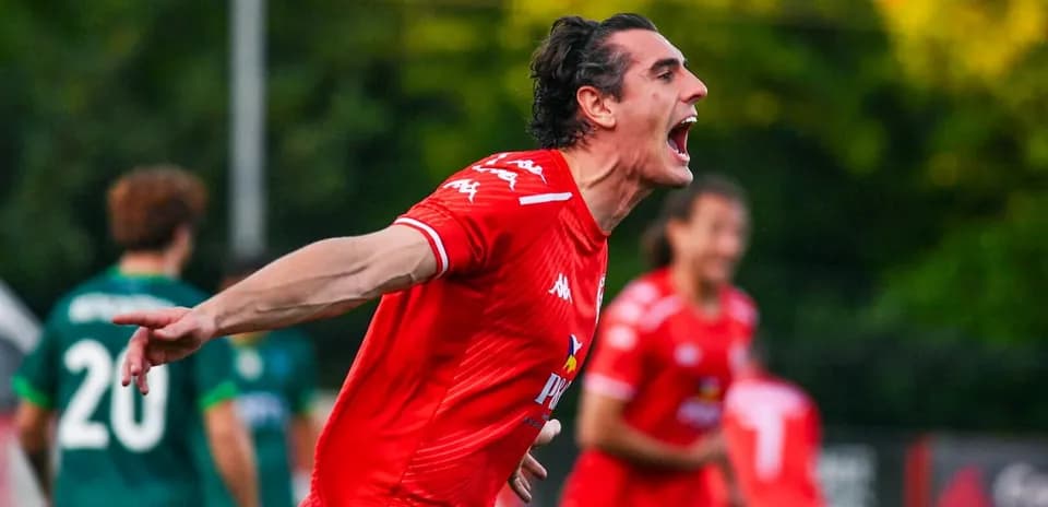 Player celebrating during Larne vs Saburtalo match